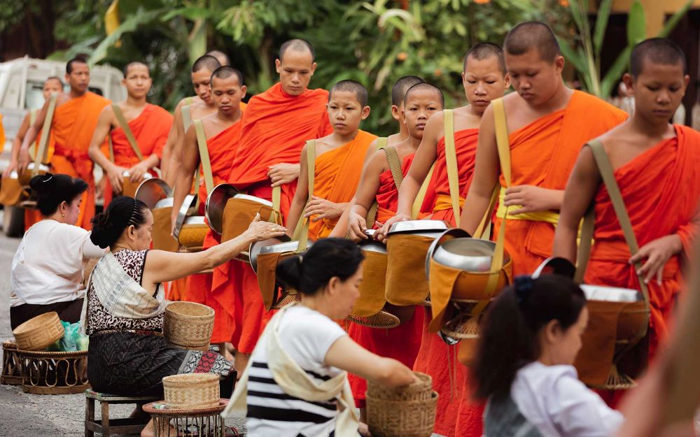 Almsgiving at That Luang Festival in Vientiane, Laos