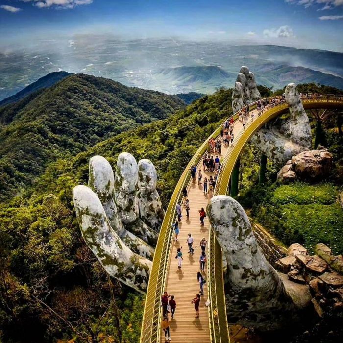 Gilded Grandeur: Exploring the Enchanting Hands Bridge in Da Nang
