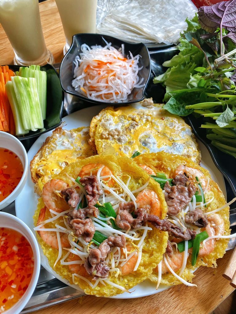 Quy Nhon Travel Guide - Mini shrimp pancakes with fresh herbs.